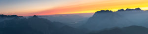 Sunrise over the Karwendel Mountains with a view of the western Karwendelspitze and the Hochkarspitze in Austria. Sunrise over the Karwendel Mountains with a view of the western Karwendelspitze and the Hochkarspitze in Austria.
