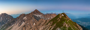 View of the Reither Spitze (2374 m) and the Seefelder Spitze (2221 m) in the Karwendel Mountains shortly after sunrise. View of the Reither Spitze (2374 m) and the Seefelder Spitze (2221 m) in the Karwendel Mountains shortly after sunrise.
