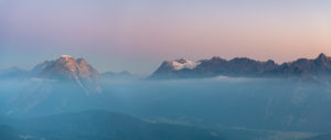 View of the Hohe Munde (2662 m) and the Zugspitze (2962 m) in the Karwendel Mountains shortly after sunrise. View of the Hohe Munde (2662 m) and the Zugspitze (2962 m) in the Karwendel Mountains shortly after sunrise.