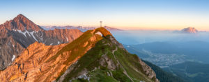 View of the Reither Spitze (2374 m) and the Seefelder Spitze (2221 m) in the Karwendel Mountains shortly after sunrise. View of the Reither Spitze (2374 m) and the Seefelder Spitze (2221 m) in the Karwendel Mountains shortly after sunrise.