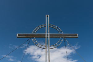 Summit cross on the Reither Spitze (2374 m) in the Karwendel Mountains in Austria. Summit cross on the Reither Spitze (2374 m) in the Karwendel Mountains in Austria.