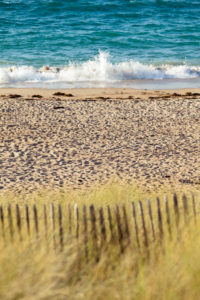 Wooden fence in a dune on the beach at Cap Frehel in Brittany, France. Wooden fence in a dune on the beach at Cap Frehel in Brittany, France.