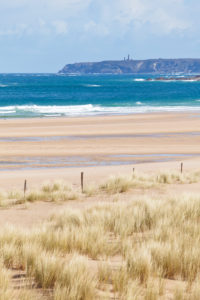 Dune landscape with a view of Cap Frehel Bretagne, on a stormy spring day. Dune landscape with a view of Cap Frehel Bretagne, on a stormy spring day.