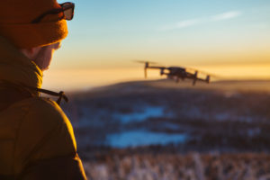 Photographer with Drone in winter Photographer with Drone in winter