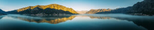 Bay of Kotor in Montenegro on the Adriatic Sea, sunrise, boats on the water in the morning mist