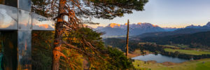 Summit cross at Gerold, reflection, Karwendel Mountain Range, sunset glow Summit cross at Gerold, reflection, Karwendel Mountain Range, sunset glow