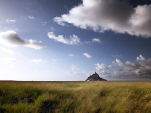Le Mont-Saint-Michel in the summer evening sun Le Mont-Saint-Michel in the summer evening sun