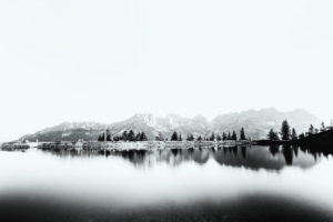 Astbergspeichersee in Going am Wilden Kaiser with the wonderful reflection of the Wilder Kaiser Astbergspeichersee in Going am Wilden Kaiser with the wonderful reflection of the Wilder Kaiser