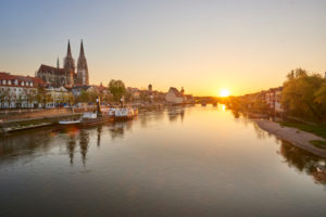Regensburg Cathedral and Stone Bridge at sunset over the Danube from the Marc Aurel Ufer, Regensburg, Bavaria, Germany Regensburg Cathedral and Stone Bridge at sunset over the Danube from the Marc Aurel Ufer, Regensburg, Bavaria, Germany