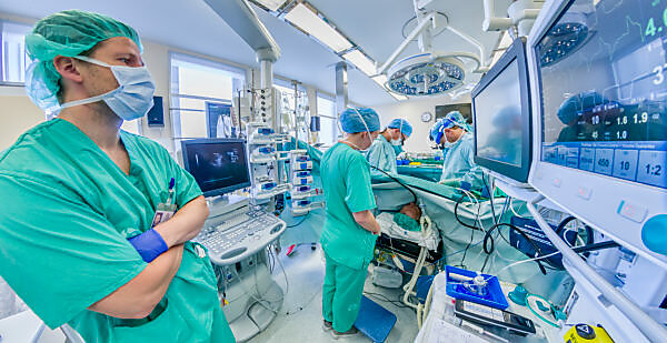 Surgeons-Heart valve replacement surgery, operating room,