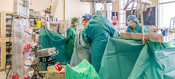 Surgeons-Heart valve replacement surgery, operating room,