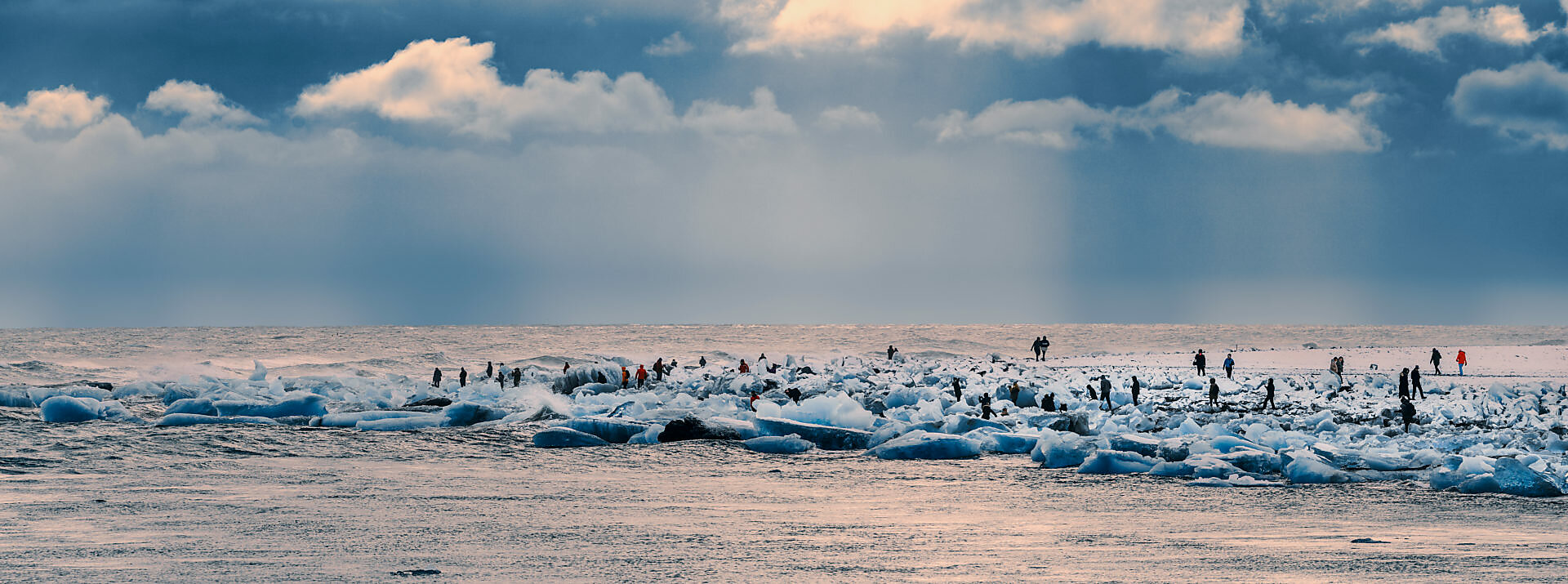 Winter - Tourists at the Jokusarlon Glacial Lagoon, Iceland Winter - Tourists at the Jokusarlon Glacial Lagoon, Iceland