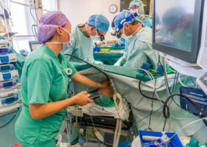 Heart valve replacement surgery, operating room,