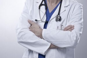 Doctor with stethoscope, arms crossed, medium close-up, detail, Doctor with stethoscope, arms crossed, medium close-up, detail,