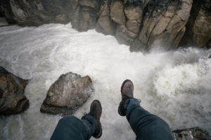 Sitting at the precipice, Jasper National Park, Canada