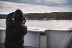 Ferry trip to Vancouver Island, man photographing, British Columbia, Canada