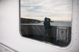 Ferry trip to Vancouver Island, man photographing, Vancouver Island, Canada