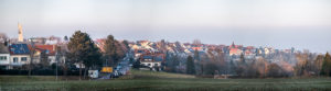 Panorama of the Stuttgart-Heumaden district with a view of the old Protestant church, the rectory and the oldest house in Heumaden (right). On the left in the picture the Catholic Thomas Morus Church. Panorama of the Stuttgart-Heumaden district with a view of the old Protestant church, the rectory and the oldest house in Heumaden (right). On the left in the picture the Catholic Thomas Morus Church.