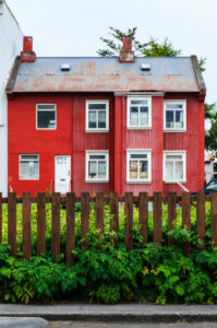 Red house with front yard in Reykjavik, Iceland Red house with front yard in Reykjavik, Iceland
