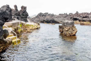 Seawater swimming pool in volcanic rock pools at Biscoitos Seawater swimming pool in volcanic rock pools at Biscoitos