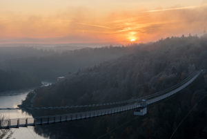 Germany, Saxony-Anhalt, Upper Harz, sunrise, suspension bridge TitanRT at the Rappbodetalsperre, Harz.