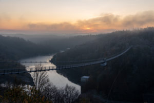 Germany, Saxony-Anhalt, Upper Harz, sunrise, suspension bridge TitanRT at the Rappbodetalsperre, Harz.