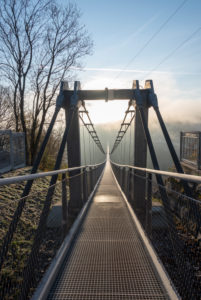 Germany, Saxony-Anhalt, Upper Harz, suspension bridge TitanRT, Rappbodetalsperre, with 483 meters one of the longest rope bridges in the world, Harz.