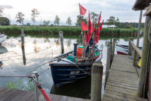 Germany, Mecklenburg-Western Pomerania, Ostseebad Sellin, Moritzdorf, fishing boat, flags Germany, Mecklenburg-Western Pomerania, Ostseebad Sellin, Moritzdorf, fishing boat, flags