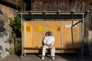 Beekeeper is waiting for the bus Beekeeper is waiting for the bus