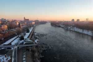 Sunrise with St. John's Church and Kaiser Otto Bridge on the horizon, built-up bank on the Elbe, Magdeburg, Saxony-Anhalt, Germany