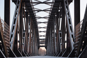 Snow-covered lift bridge, steel construction, listed building, former railroad bridge, Magdeburg, Saxony-Anhalt, Germany
