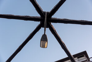 Detail, street lighting, snow-covered lift bridge, steel construction, listed building, former railroad bridge, Magdeburg, Saxony-Anhalt, Germany