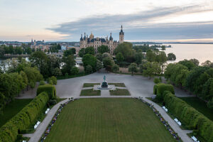 Schwerin Castle, situated on an island, surrounded by water, soft morning light, Schwerin, Mecklenburg-Vorpommern, Germany
