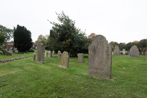 Old cemetery near St. Johannis Church, Nieblum, Föhr Island, Schleswig-Holstein, Germany