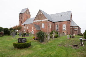 Old cemetery near St. Johannis Church, Nieblum, Föhr Island, Schleswig-Holstein, Germany