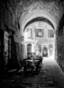 Sorano, Tuscany, Italy, restaurant, archway, old town, black and white Sorano, Tuscany, Italy, restaurant, archway, old town, black and white
