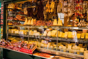 Bolzano, fruit market, ham, bacon and cheese Bolzano, fruit market, ham, bacon and cheese
