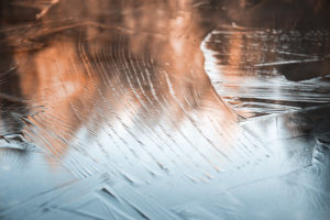 A frozen lake in the Tyrolean Alps creates a painting-like impression A frozen lake in the Tyrolean Alps creates a painting-like impression