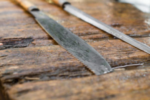 A Japanese balde of a knife on a workbench at the fish market Tokyo