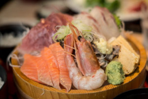A plate with fresh fish at the fish market in Tokyo