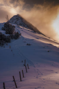 Sunset in a wintry mountain landscape Sunset in a wintry mountain landscape