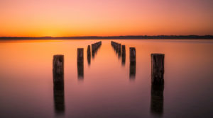 Broken jetty at the lake Broken jetty at the lake