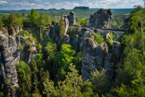 Bridge named Bastei in Saxon Switzerland, at sunrise and the mist over the river Elbe, National park Saxon Switzerland. Bridge named Bastei in Saxon Switzerland, at sunrise and the mist over the river Elbe, National park Saxon Switzerland.