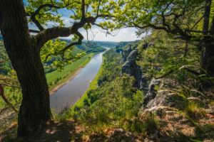 Germany. View from the Bastei rock formation down the Elbe river. Visiting Saxon Switzerland National Park in spring season. Germany. View from the Bastei rock formation down the Elbe river. Visiting Saxon Switzerland National Park in spring season.