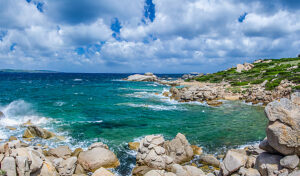 Windy costline with sandstone rocks near Costa Serena, Sardinia -Italy