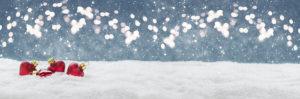 Christmas background, hearts in the snow in front of Bokeh, banner Christmas background, hearts in the snow in front of Bokeh, banner