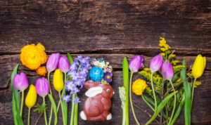 Easter basket with Easter bunny and Easter egg on wood, Easter decoration Easter basket with Easter bunny and Easter egg on wood, Easter decoration