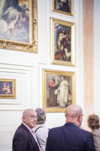 Visitors in the room V (Sevillian Baroque), Museum of Fine Arts, Seville, Spain. Tilted lens used for shallower depth of field.