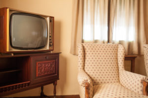 Vintage TV in an old fashioned hotel room, Guadalara, Spain