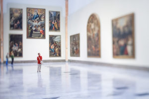 Visitors in the room V (Sevillian Baroque), Museum of Fine Arts, Seville, Spain. Tilted lens used for shallower depth of field.